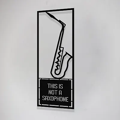 Çerçeve İçinde This İs Not A Saxophone Tasarım Metal Tablosu 70x25cm